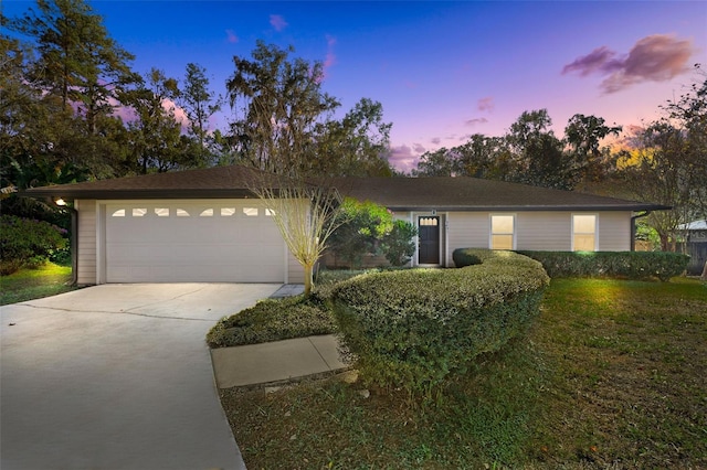 ranch-style home with a garage