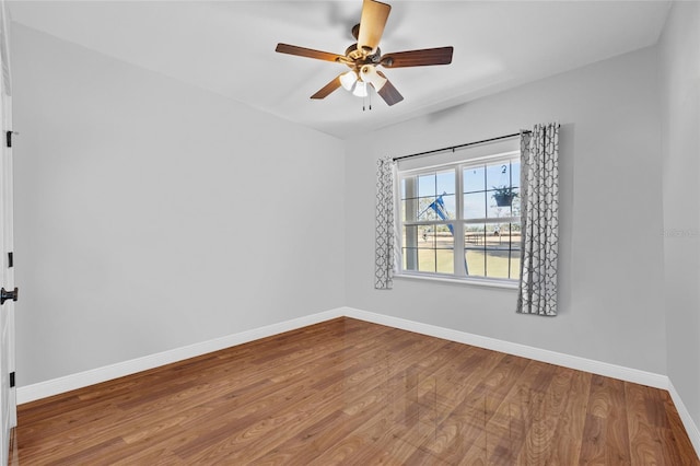 unfurnished room featuring ceiling fan and wood-type flooring