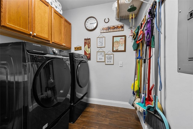 laundry room with cabinets and washer and clothes dryer