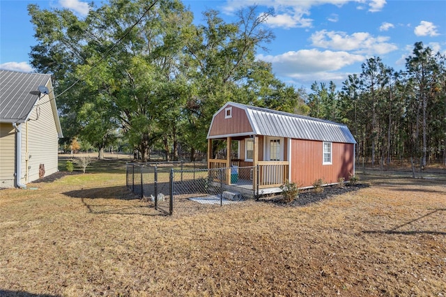 exterior space featuring an outbuilding