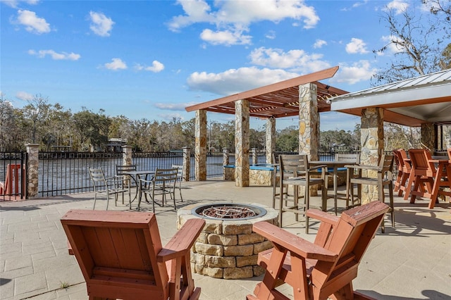 view of patio / terrace with an outdoor fire pit