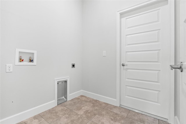 clothes washing area with hookup for a washing machine, light tile patterned floors, and hookup for an electric dryer