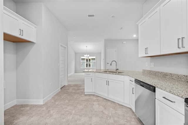 kitchen featuring dishwasher, light stone countertops, white cabinetry, and sink