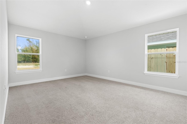 view of carpeted spare room