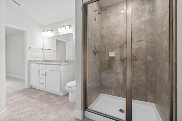 bathroom with tile patterned floors, an enclosed shower, vanity, toilet, and lofted ceiling