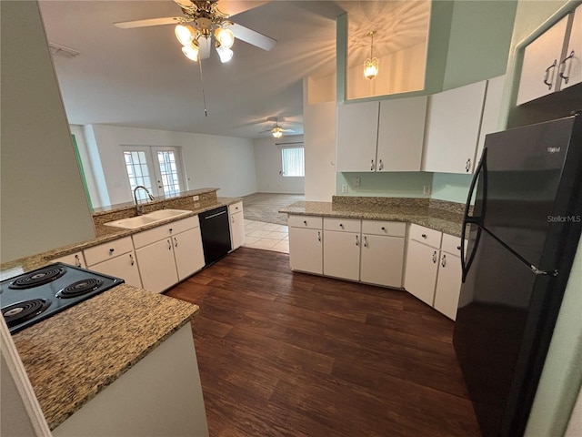 kitchen featuring black appliances, dark hardwood / wood-style floors, white cabinets, and sink