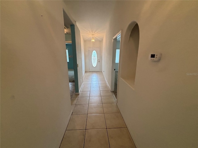 hallway featuring light tile patterned flooring