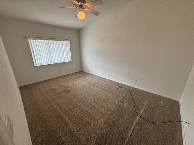 unfurnished room with carpet flooring and ceiling fan