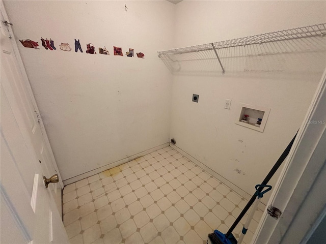 clothes washing area with washer hookup and hookup for an electric dryer