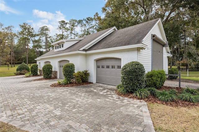 view of front of home with a garage