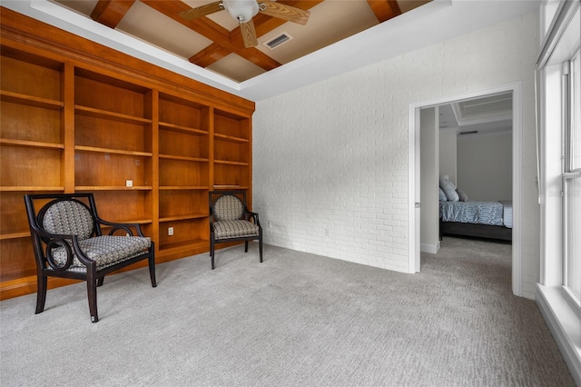 7106 NW 18th Ave, Gainesville, FL 32605 - sitting room with coffered ceiling, carpet, brick wall, visible vents, and a ceiling fan