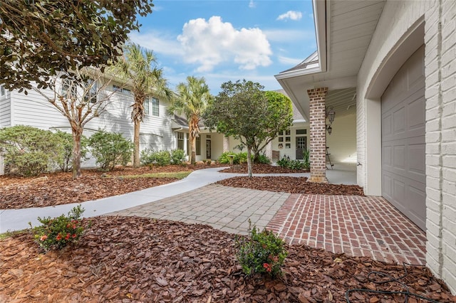 7106 NW 18th Ave, Gainesville, FL 32605 - view of patio with an attached garage