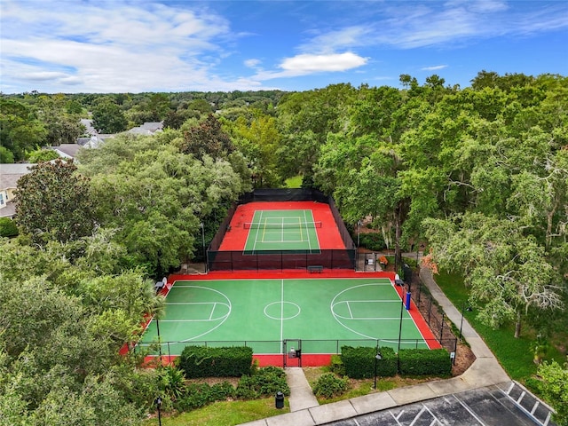 view of sport court featuring tennis court