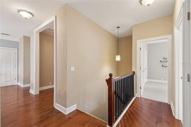 hallway featuring dark wood-type flooring