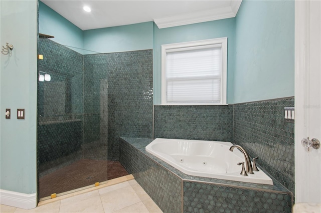 bathroom featuring tile patterned flooring, separate shower and tub, and ornamental molding