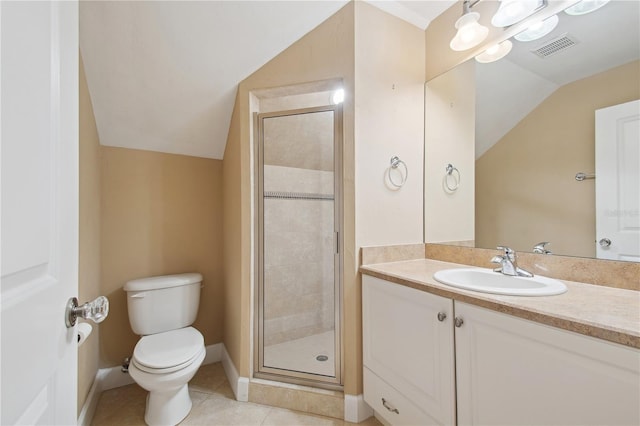 bathroom with vanity, tile patterned floors, vaulted ceiling, toilet, and a shower with shower door