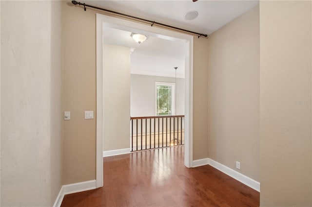 unfurnished room featuring wood-type flooring