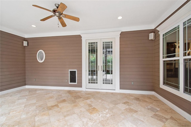 view of patio / terrace featuring ceiling fan and french doors