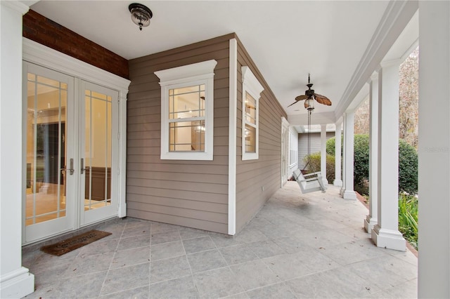 view of patio / terrace with ceiling fan and french doors