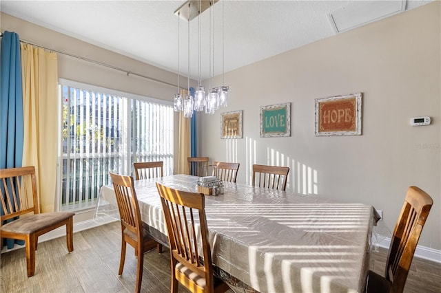 dining area featuring hardwood / wood-style flooring