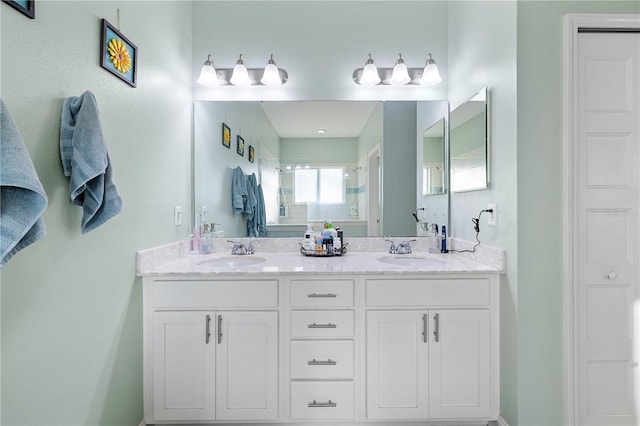 bathroom with vanity and walk in shower