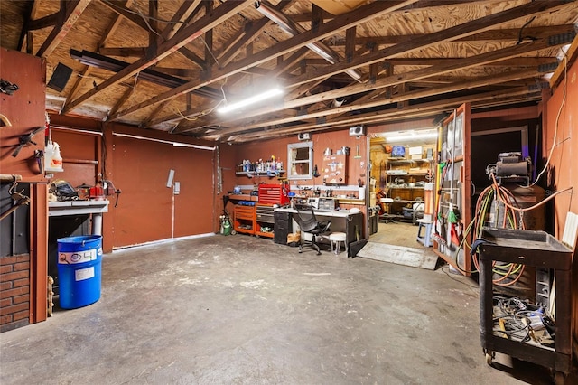 garage featuring a workshop area