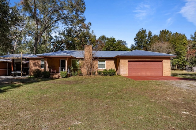 ranch-style home featuring a garage and a front yard