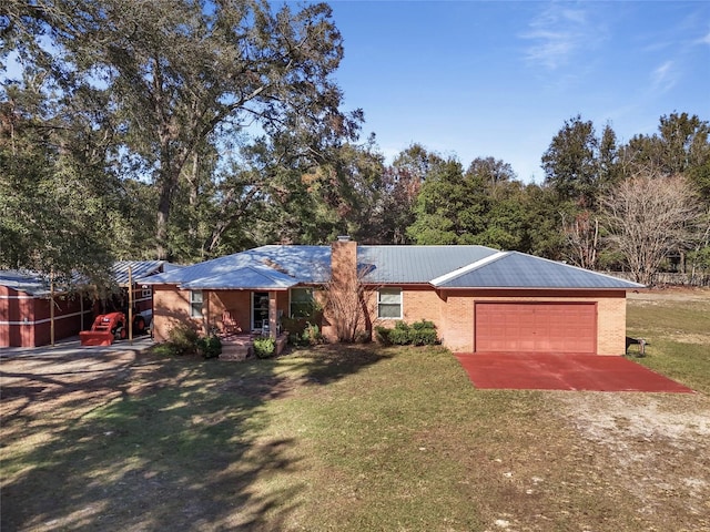 ranch-style house with a garage and a front yard