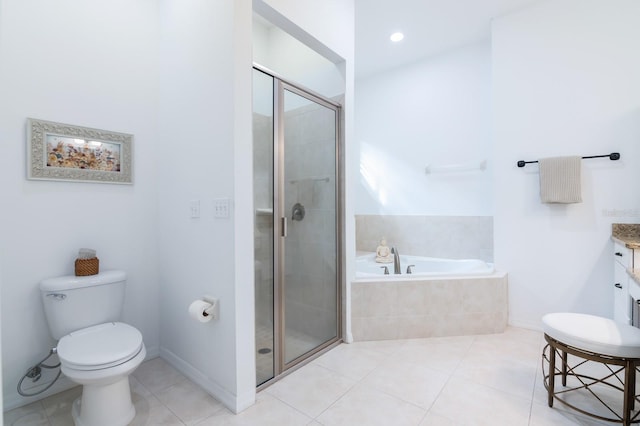 full bathroom with tile patterned floors, vanity, toilet, and independent shower and bath