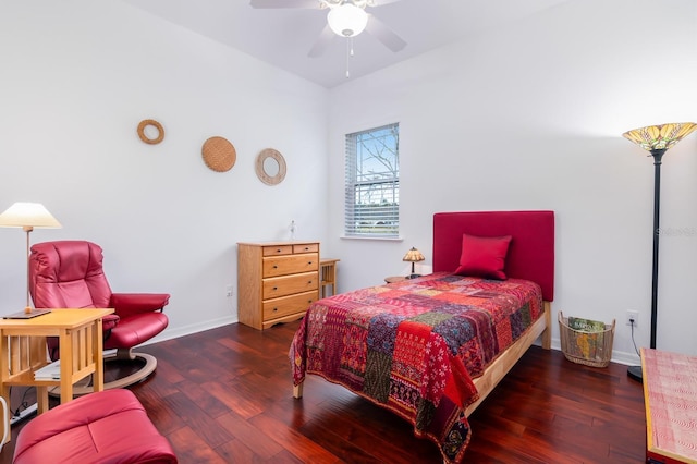 bedroom featuring dark hardwood / wood-style flooring and ceiling fan