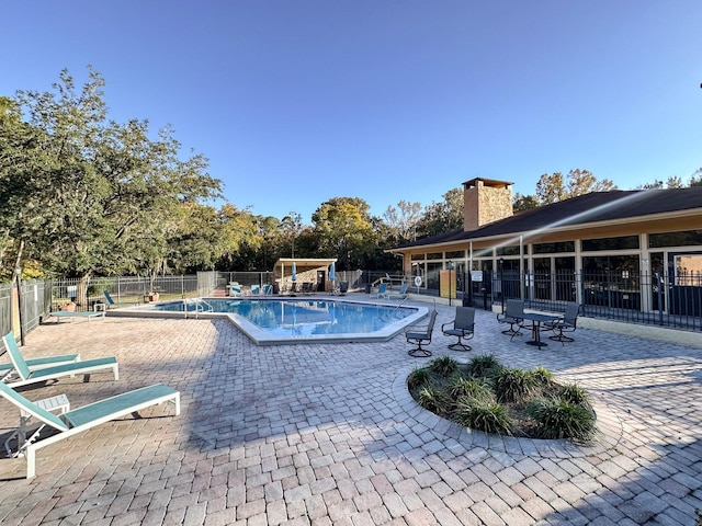 view of pool with a patio