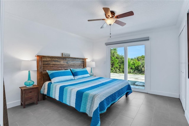 tiled bedroom featuring ceiling fan, ornamental molding, and access to outside