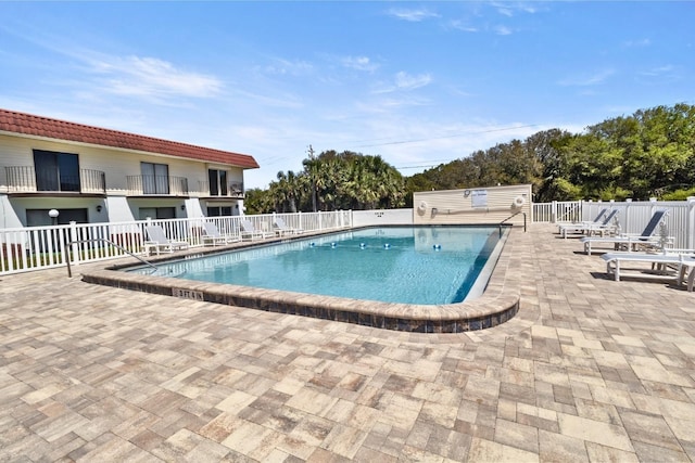 14 Ocean Palm Villa S Unit 14, Flagler Beach, FL 32136 - community pool featuring a patio and fence