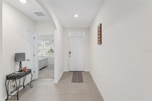 interior space featuring light tile patterned floors