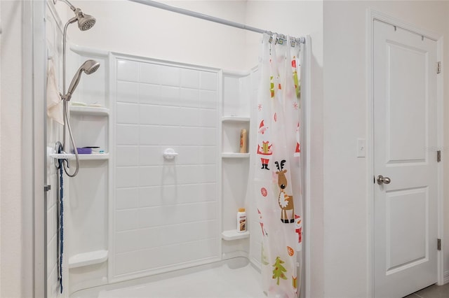 bathroom featuring walk in shower