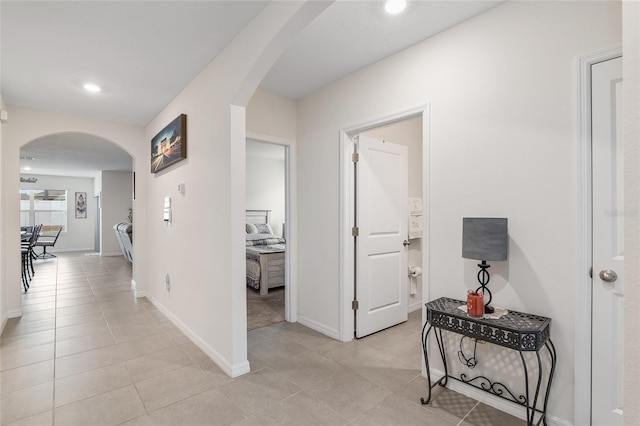 hallway with light tile patterned flooring