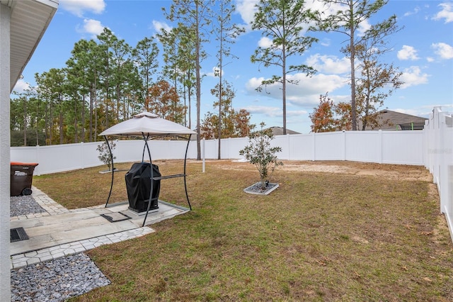 view of yard with a gazebo and a patio area