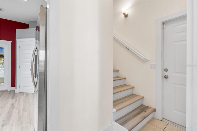 stairs featuring tile patterned floors