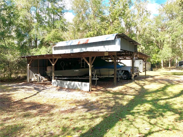 view of parking / parking lot with a carport