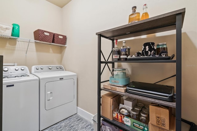 laundry area with independent washer and dryer