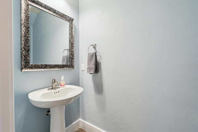 bathroom with baseboards