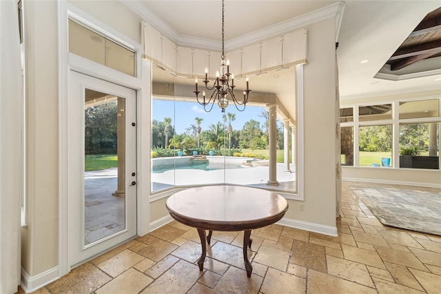 doorway with a chandelier and ornamental molding