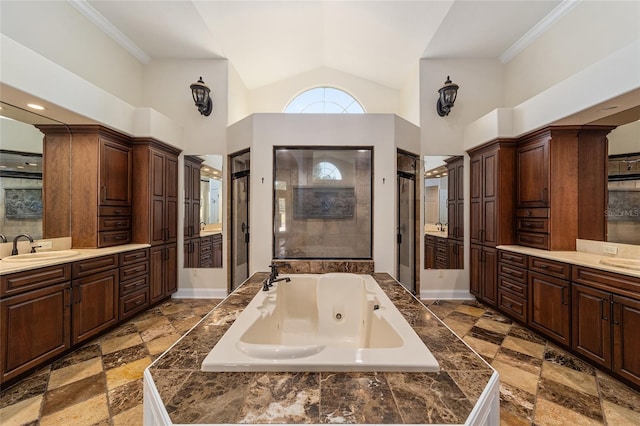 bathroom with vanity, a towering ceiling, crown molding, and independent shower and bath