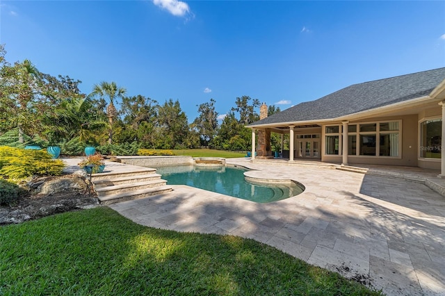 view of pool featuring a patio area