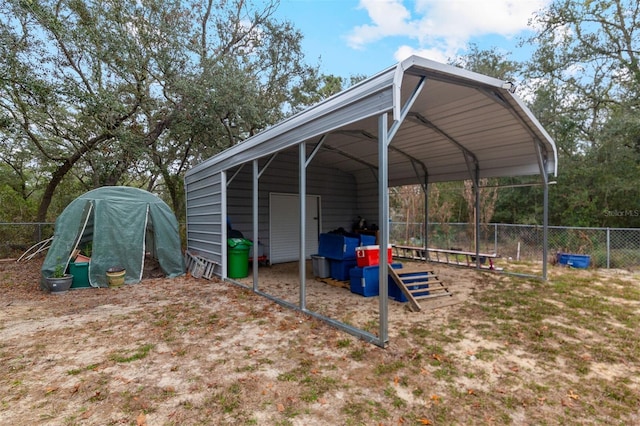 view of outbuilding featuring a carport