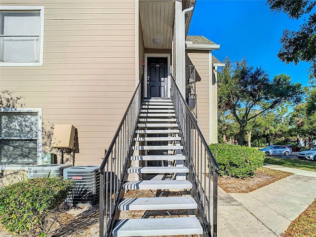 doorway to property with central air condition unit