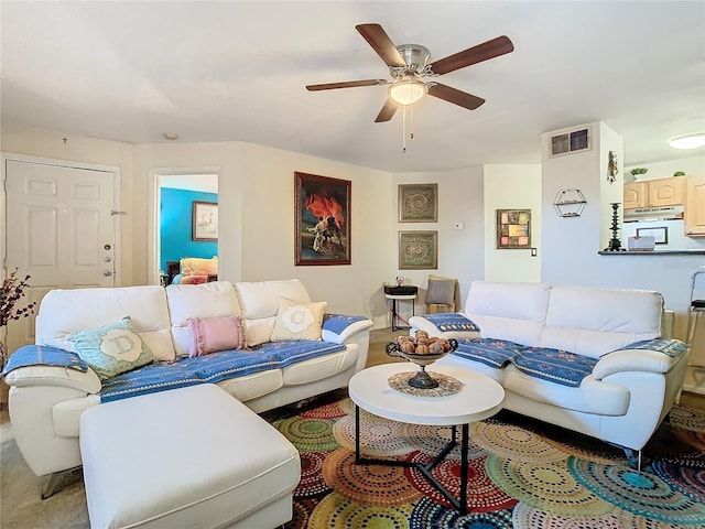 living room featuring ceiling fan