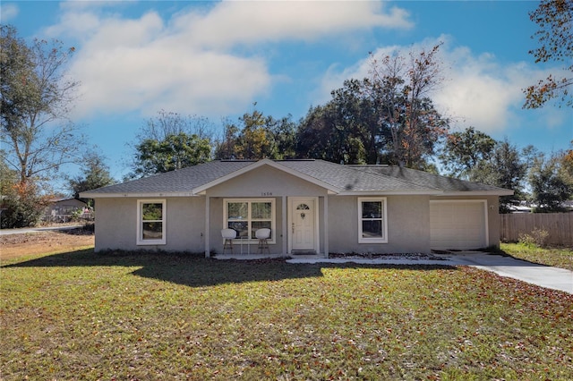 ranch-style home with a front yard, a porch, and a garage