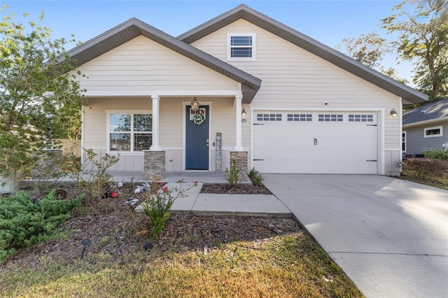 craftsman-style home with a garage and covered porch