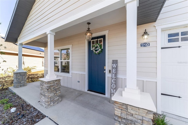 property entrance with a porch